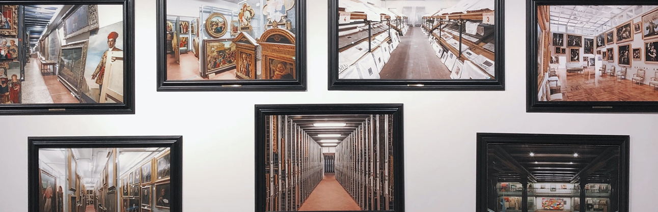 Framed photographs positioned along a wall.
